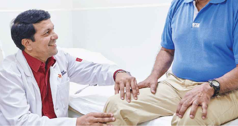 A Neurosurgeon Treating His Senior Patient For His Neuro Disorder. 