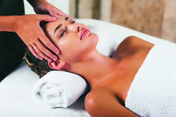 A Young Girl Taking Head Massage And Get Relax.