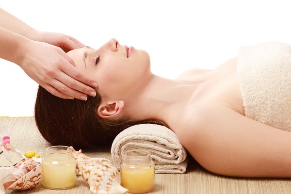 A Woman Getting Head massage For Relaxation.