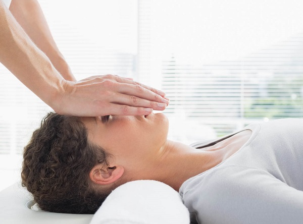 Reiki Massage On Face.