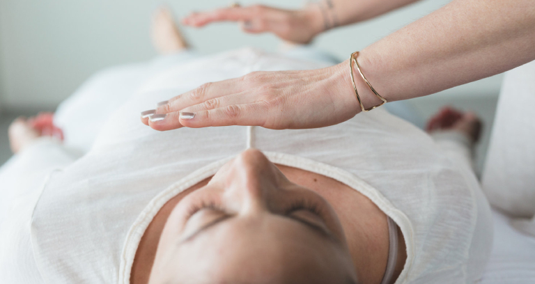 A Woman On A Reiki Session.