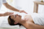 A Woman Getting Reiki Healing To Stay Away From Depression.