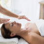 A Woman Getting Reiki Healing To Stay Away From Depression.